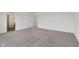 A spacious carpeted bedroom with an en-suite bathroom at 10416 Crystal Coop Ln, Indianapolis, IN 46235