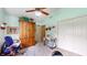 Bright bedroom with vaulted ceilings, ample closet space, and a ceiling fan at 1067 Acadia Ct, Indianapolis, IN 46217