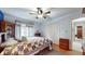 A bright bedroom features wooden floors and ample closet space at 1067 Acadia Ct, Indianapolis, IN 46217