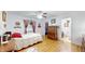 A comfortable bedroom features wooden floors and vintage decorations at 1067 Acadia Ct, Indianapolis, IN 46217