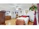 A spacious bedroom features wooden floors and vintage decorations at 1067 Acadia Ct, Indianapolis, IN 46217