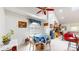 A cozy dining room features a round table with a blue tablecloth and decor at 1067 Acadia Ct, Indianapolis, IN 46217