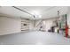 Bright and spacious garage featuring a finished floor and ample storage shelves at 1067 Acadia Ct, Indianapolis, IN 46217