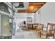 Basement with utility equipment, a table with chairs, and an open layout, providing flexibility for various uses at 1130 E 105Th St, Carmel, IN 46280