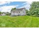 Exterior of a house with a well-kept lawn at 1130 E 105Th St, Carmel, IN 46280