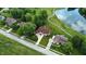 Neighborhood houses overlooking pond and golf course at 1326 Pebble Brook Dr, Noblesville, IN 46062