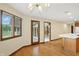 The dining area features hardwood floors, windows, and access to the outdoors at 1326 Pebble Brook Dr, Noblesville, IN 46062