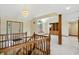 Bright entryway with marble floors, wood railings, and an open concept layout at 1326 Pebble Brook Dr, Noblesville, IN 46062