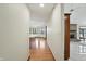 View down long hallway to the kitchen and living room at 1326 Pebble Brook Dr, Noblesville, IN 46062