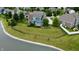 Expansive backyard featuring mature trees, landscaping, a fence, and access to a peaceful pond at 13895 Cloverfield Cir, Fishers, IN 46038
