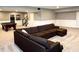Finished basement featuring neutral carpeting, a large sectional sofa, and a pool table at 13895 Cloverfield Cir, Fishers, IN 46038