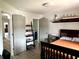 Bright and open bedroom with multiple doors and decor at 13895 Cloverfield Cir, Fishers, IN 46038