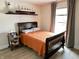 Comfortable bedroom with decorative shelves and a warm, inviting atmosphere at 13895 Cloverfield Cir, Fishers, IN 46038