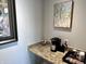 Coffee bar featuring granite countertops, a Keurig, and a variety of mugs at 13895 Cloverfield Cir, Fishers, IN 46038