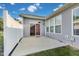 The home has a back patio complete with sliding glass doors at 1396 Lexington Trl, Greenfield, IN 46140
