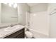 Well-lit bathroom featuring modern fixtures, a vanity, and a shower-tub combination at 1396 Lexington Trl, Greenfield, IN 46140