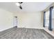 Bright bedroom features modern flooring and a large window, perfect for relaxing at 1396 Lexington Trl, Greenfield, IN 46140