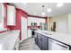 Well-equipped kitchen featuring an island, stainless steel appliances, and granite countertops at 1396 Lexington Trl, Greenfield, IN 46140