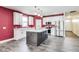 Modern kitchen with an island, stainless steel appliances, and granite countertops at 1396 Lexington Trl, Greenfield, IN 46140