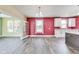 Open-concept area showcases modern flooring and ample natural light at 1396 Lexington Trl, Greenfield, IN 46140