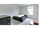 Bedroom featuring under-bed storage, desk, and carpet at 15192 Montfort Dr, Noblesville, IN 46062