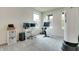 Bedroom featuring white walls, two windows, a desk, a Peloton, and a punching bag at 15192 Montfort Dr, Noblesville, IN 46062
