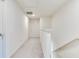 Hallway featuring carpet flooring and a view of the staircase at 15192 Montfort Dr, Noblesville, IN 46062