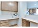 Convenient office area with built-in desk, cabinets, and drawers at 15192 Montfort Dr, Noblesville, IN 46062