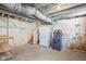 An unfinished basement with painted brick walls offers the opportunity for customizable renovations at 1531 N College Ave, Indianapolis, IN 46202
