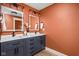 Modern bathroom featuring a double vanity with framed mirrors and stylish lighting at 1531 N College Ave, Indianapolis, IN 46202