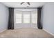 Bedroom featuring a bay window with curtains and blinds at 1531 N College Ave, Indianapolis, IN 46202
