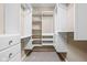Walk-in closet equipped with custom shelving, drawers, and ample storage space at 1531 N College Ave, Indianapolis, IN 46202