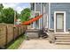 A private hot tub sits outside this home, protected by a shade, and situated on a brick patio at 1531 N College Ave, Indianapolis, IN 46202