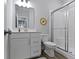 Bathroom featuring modern vanity, quartz countertop, and glass enclosed shower at 15546 Senita Ln, Fishers, IN 46037
