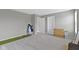 Neutral bedroom featuring carpeted floors, a golf setup, and two paneled doors at 15546 Senita Ln, Fishers, IN 46037