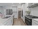 Well-equipped kitchen with stainless steel appliances, ample cabinet space, granite counters, and a walk-in pantry at 15546 Senita Ln, Fishers, IN 46037