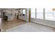 Open-concept kitchen flows into the living area, featuring modern appliances and ample counter space at 15546 Senita Ln, Fishers, IN 46037