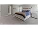 Spacious main bedroom featuring a tray ceiling, plush carpet, and ample space for furniture at 15546 Senita Ln, Fishers, IN 46037
