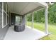 Covered patio space with concrete flooring, perfect for outdoor relaxation and entertainment at 15546 Senita Ln, Fishers, IN 46037
