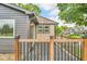 This lovely outdoor patio is enhanced by wooden fencing, providing a charming and private area for relaxation at 1555 N Dearborn St, Indianapolis, IN 46201