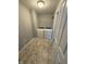 Practical laundry room with a washer, dryer, tile floors, and ample space for storage at 15961 Foothill Dr, Noblesville, IN 46060