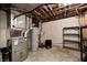 Unfinished basement with essential utilities, offering potential for customization and additional storage space at 1660 Obara Ct, Carmel, IN 46033