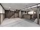 Finished basement featuring dark wainscotting, carpet, and staircase to the upper levels at 1660 Obara Ct, Carmel, IN 46033
