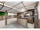 Basement offers a wet bar with a sink, wood paneling, and ample recreational space at 1660 Obara Ct, Carmel, IN 46033