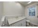 Bathroom with neutral walls, and a marble sink top at 1660 Obara Ct, Carmel, IN 46033
