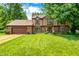 Charming two-story home with a well-manicured lawn and a classic Tudor-style facade at 1660 Obara Ct, Carmel, IN 46033