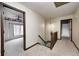 Hallway with stairs and two bedroom entrances at 1660 Obara Ct, Carmel, IN 46033