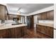 Kitchen features wooden cabinetry, stainless appliances, and plenty of counter space at 1660 Obara Ct, Carmel, IN 46033