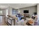 Cozy living room showcasing contemporary decor, a modern entertainment center, and comfortable seating arrangements at 17030 Daly Dr, Noblesville, IN 46062