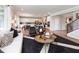 Open-concept living area with modern furnishings, a dining space, and lots of natural light at 17050 Daly Dr, Noblesville, IN 46062